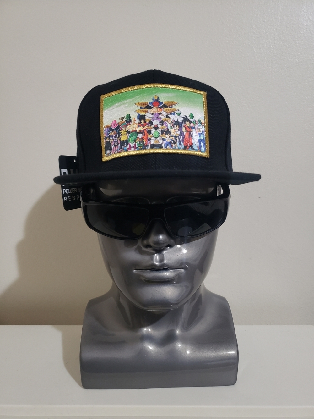 Black Patch Trucker Hat with Colorful Anime Group Patch